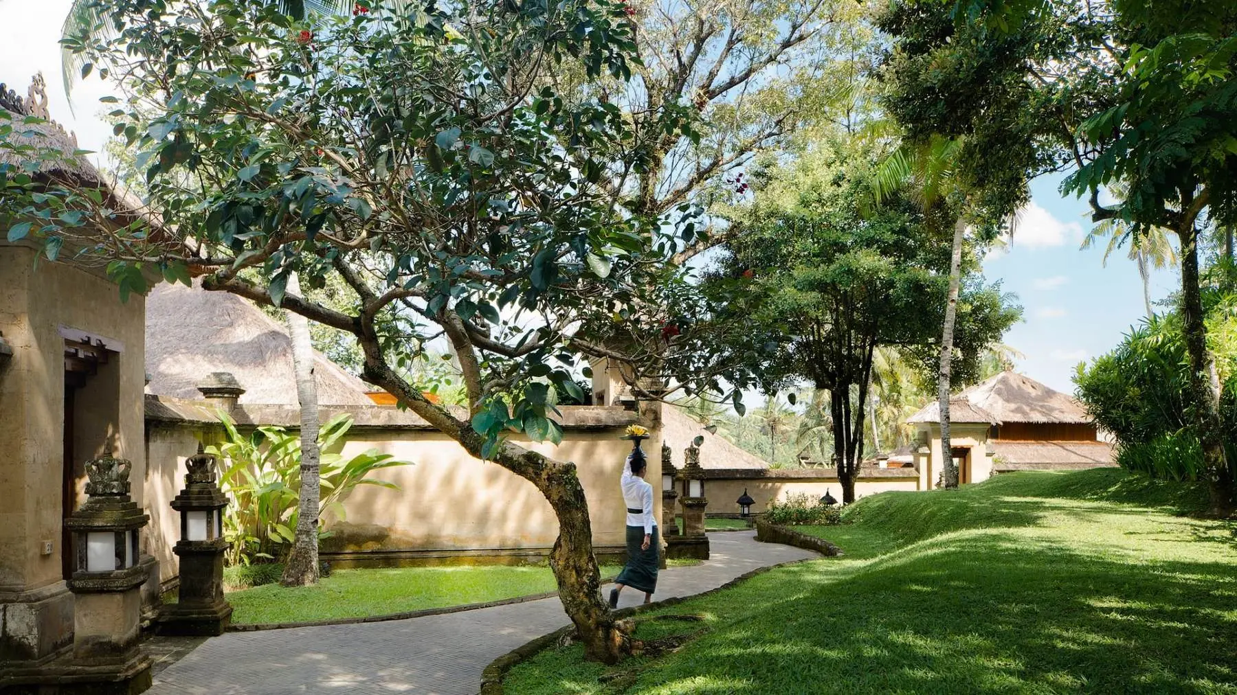 A village gate at the entrance to a suite at Amandari