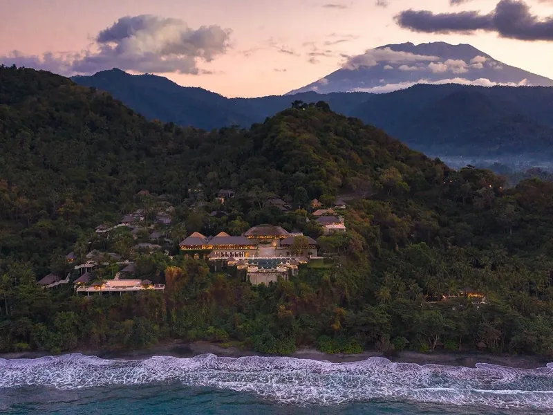 Amankila at dusk, cut into the hillside above the Lombok Strait