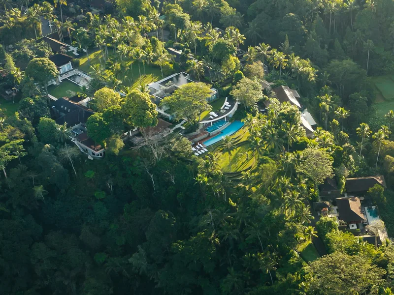 Aerial view of Como Shambhala Estate, its residences and pools set into the jungle ridge