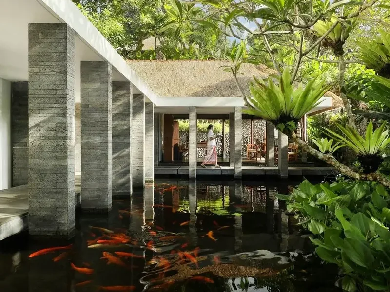 Koi pond walkway at Como Uma Ubud's reception