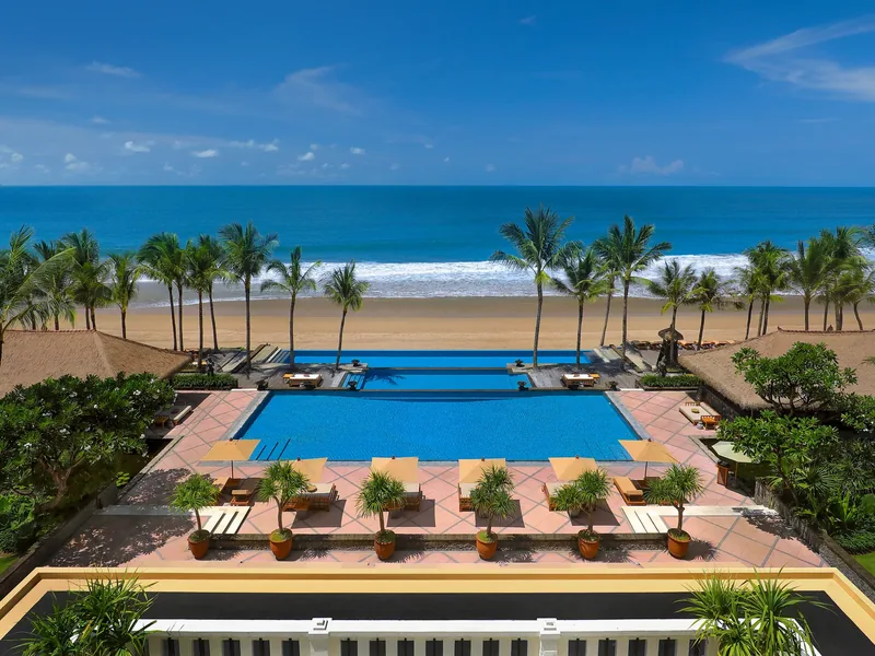 The Legian's pools stepping down to the beach and the Indian Ocean