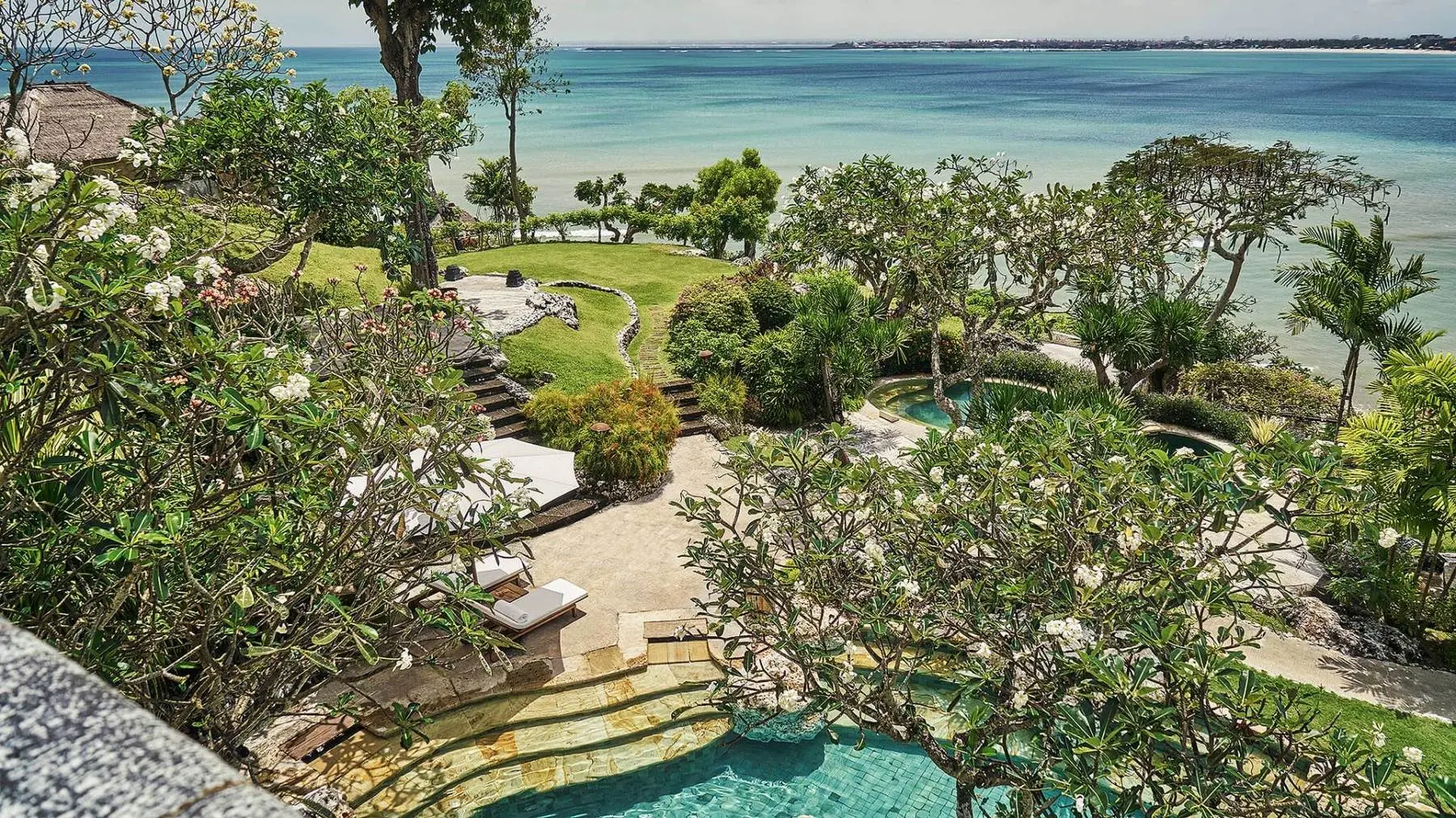 Four Seasons Jimbaran Bay from above, a village of villas stepping down to the bay