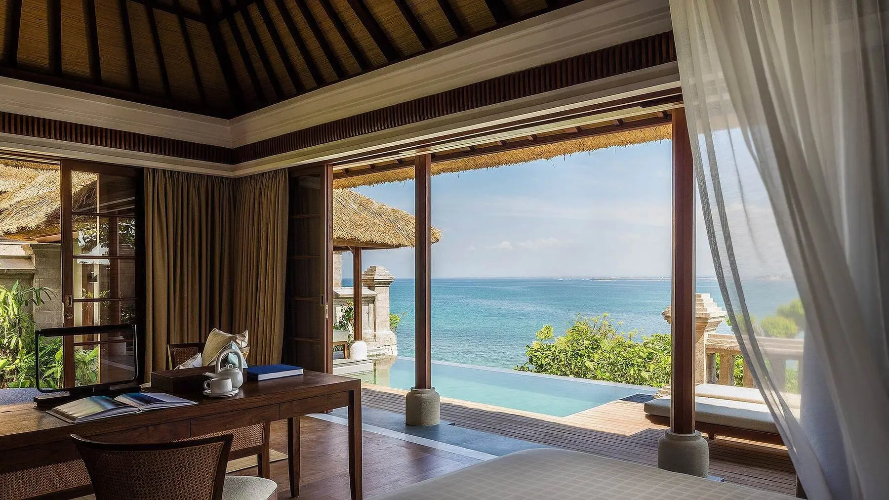An ocean-facing villa bedroom at Four Seasons Jimbaran Bay
