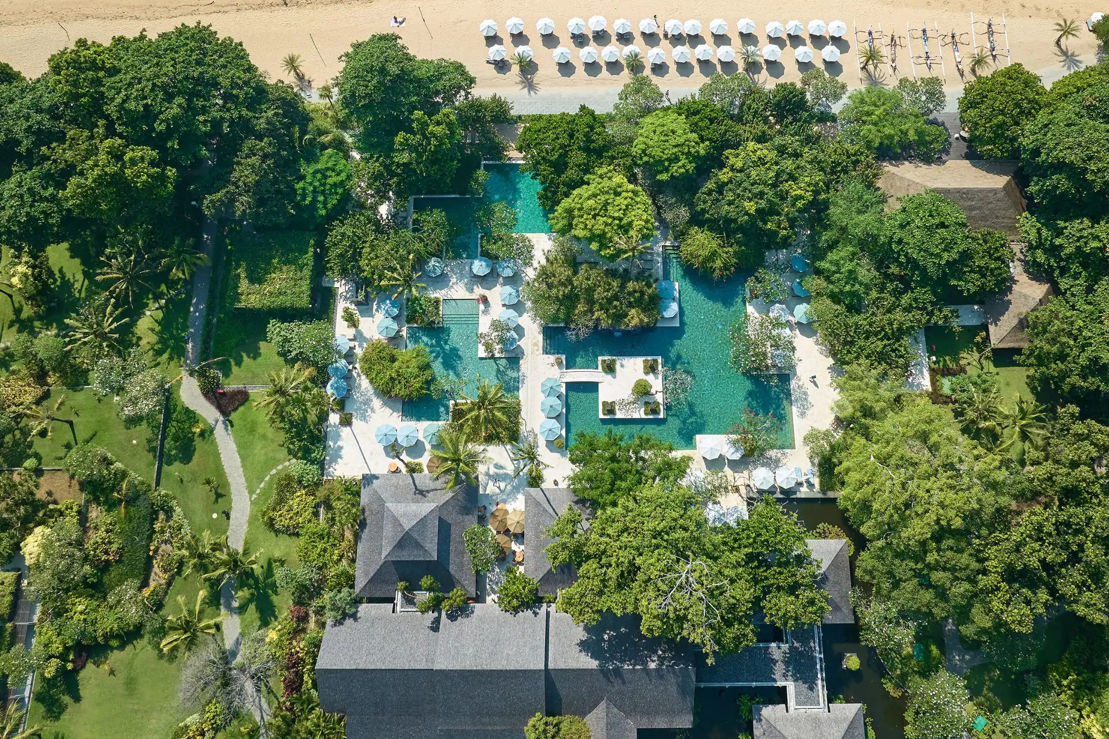 An aerial view of the gardens and low buildings at Hyatt Regency Bali in Sanur