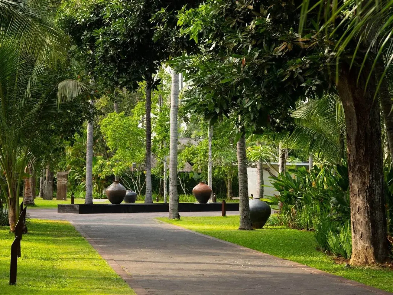A garden path between the private villas at Kayumanis Jimbaran