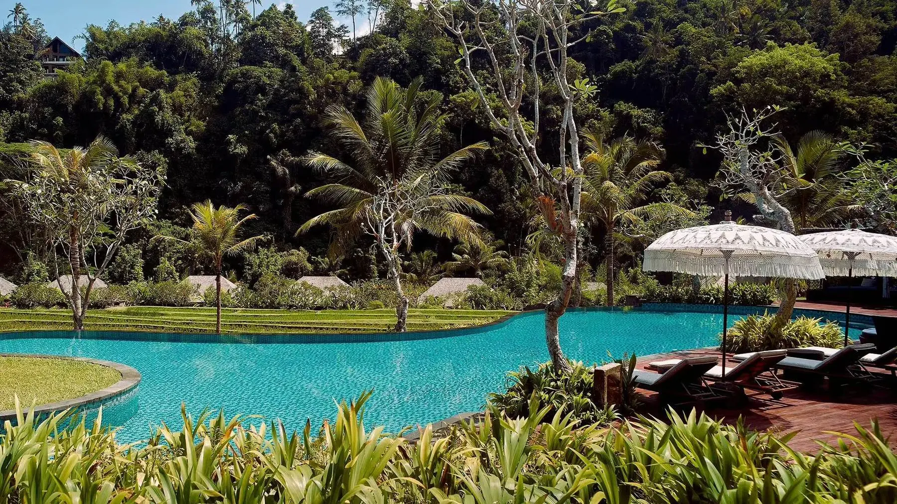 The dining cocoons at Kubu, Mandapa, beside the Ayung river