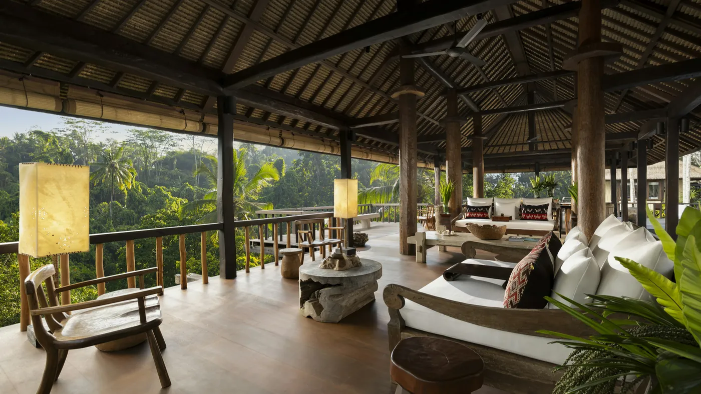 The open-sided living pavilion of a Residence at Como Shambhala Estate, looking out over the jungle