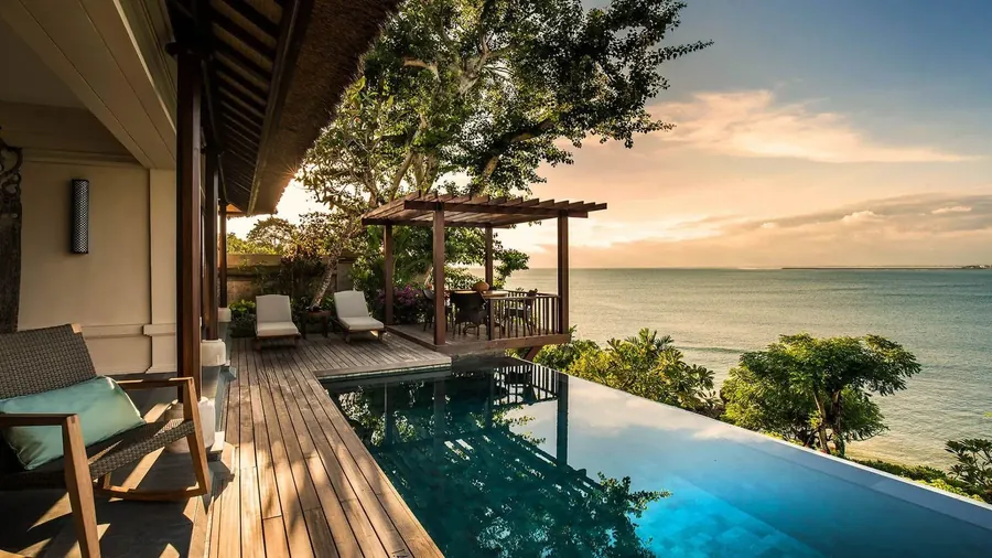 A villa pool at Four Seasons Jimbaran Bay at sunset