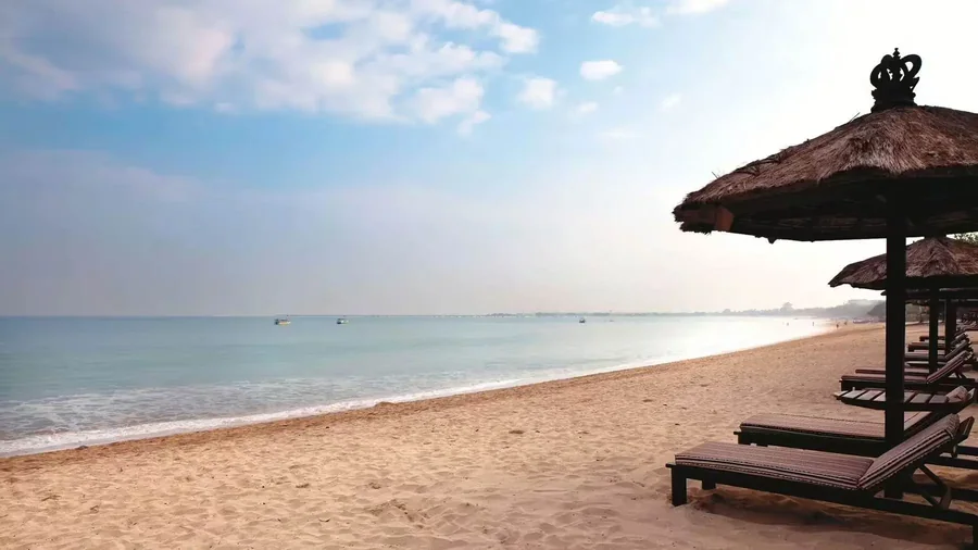The wide gold sand of Jimbaran Bay