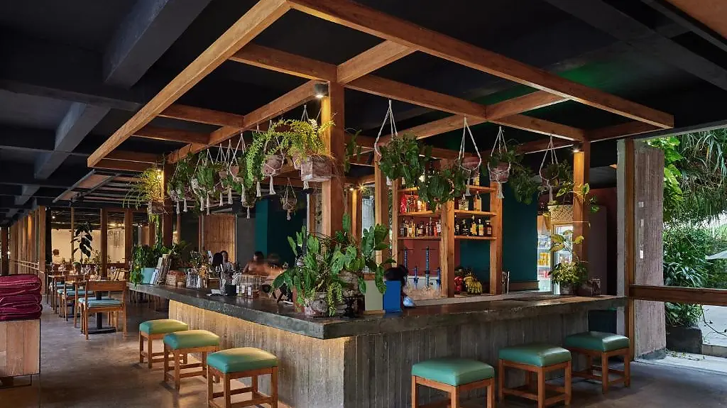 The plant-filled bar at the central hub of Shore Amora, Pererenan