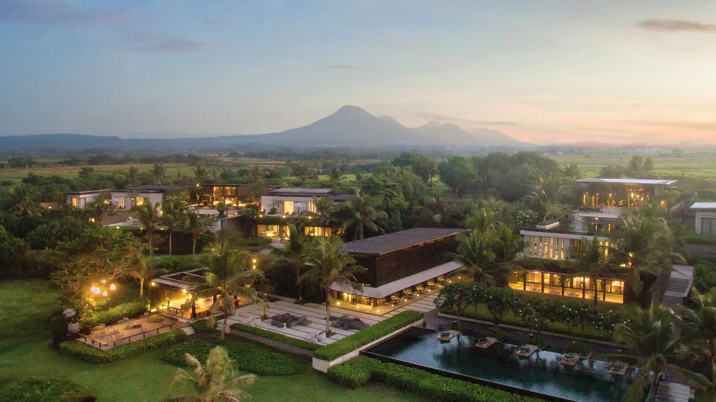 Soori Bali on the black-sand coast below the mountains