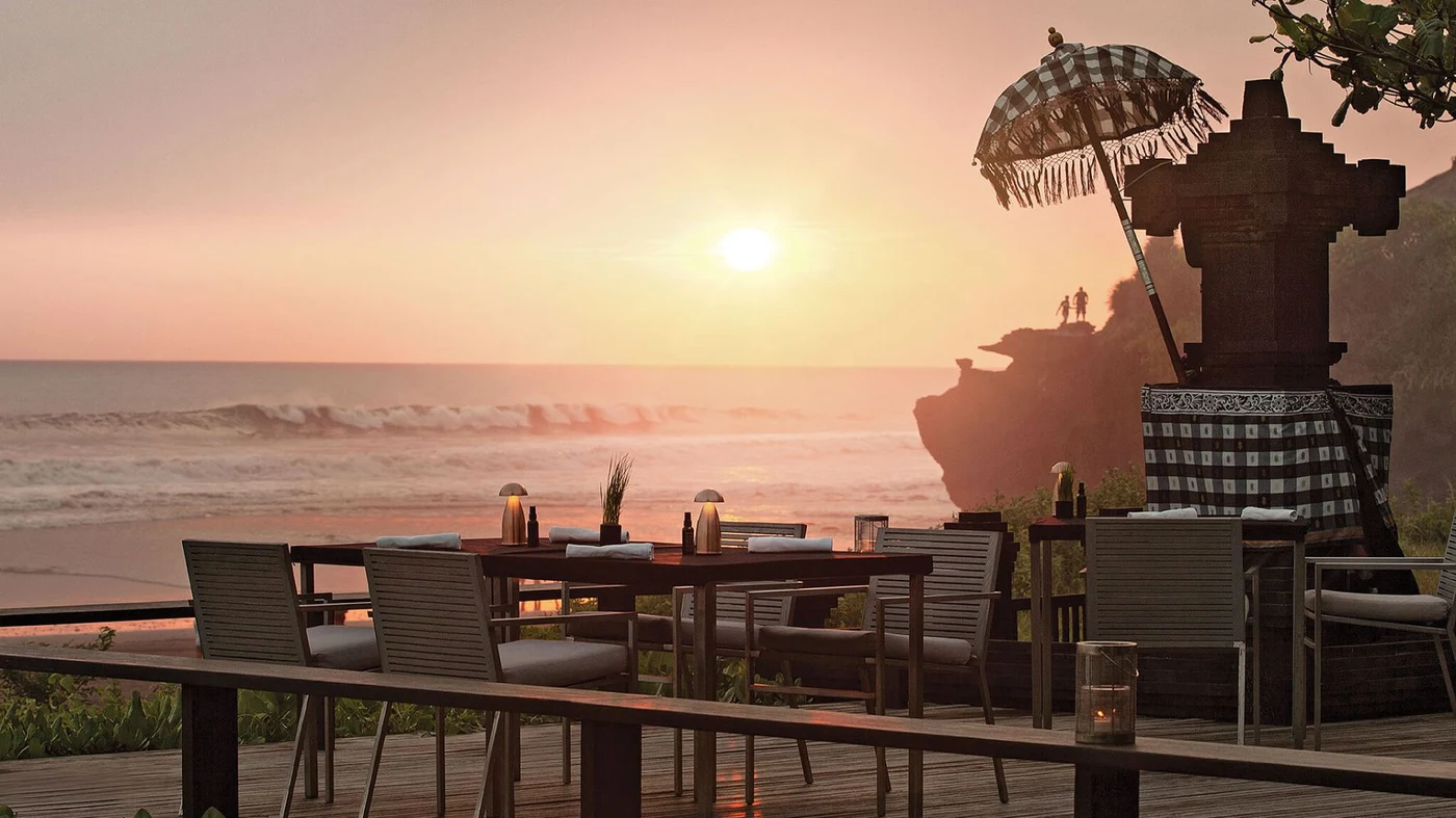 Timber screens and a reflecting pond at Soori Bali, the boundary between inside and outside dissolved