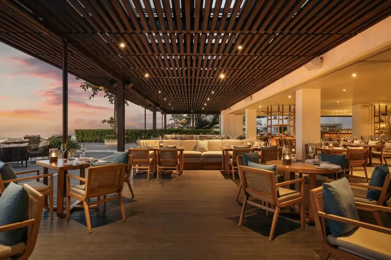 The open-sided lounge at Seasalt, Alila Seminyak's main restaurant, at sunset