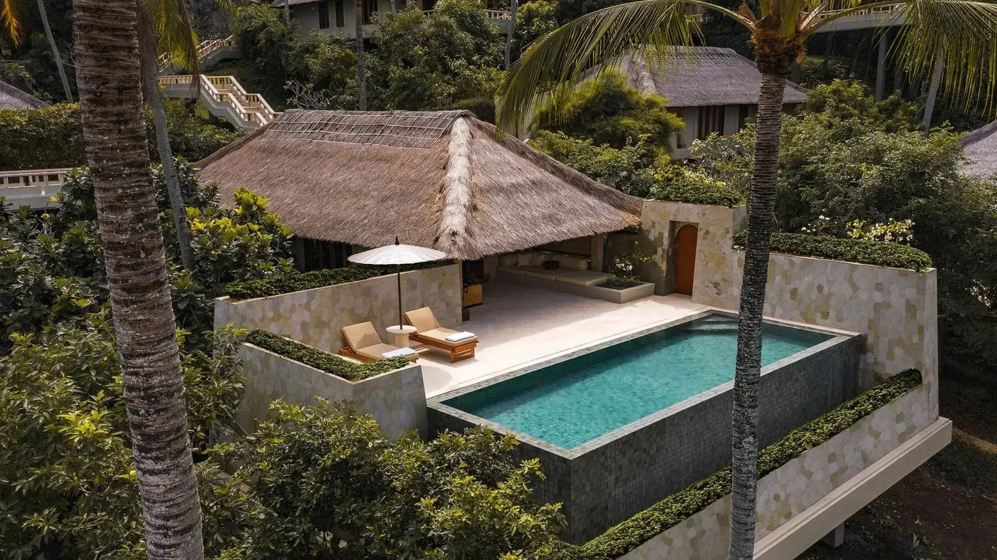 Aerial view of one of Amankila's private pool suites, tucked into the jungle with its own plunge pool