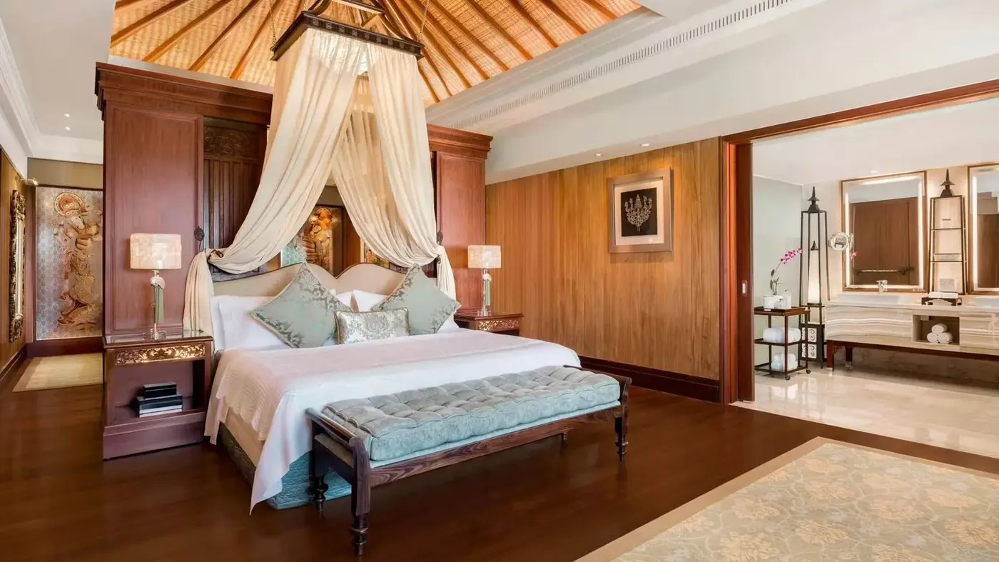Colonial-style suite bedroom at The St. Regis Bali Resort