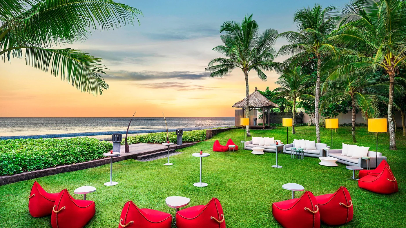 The lawn above the beach at W Bali at sunset